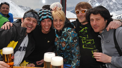 Apres ski party with friends on your slopeside deck.